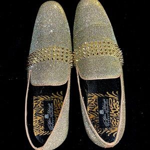 Silver and gold formal men’s loafers.
